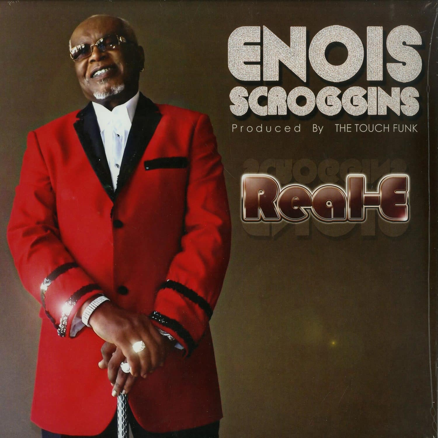 Enois Scroggins - REAL E 