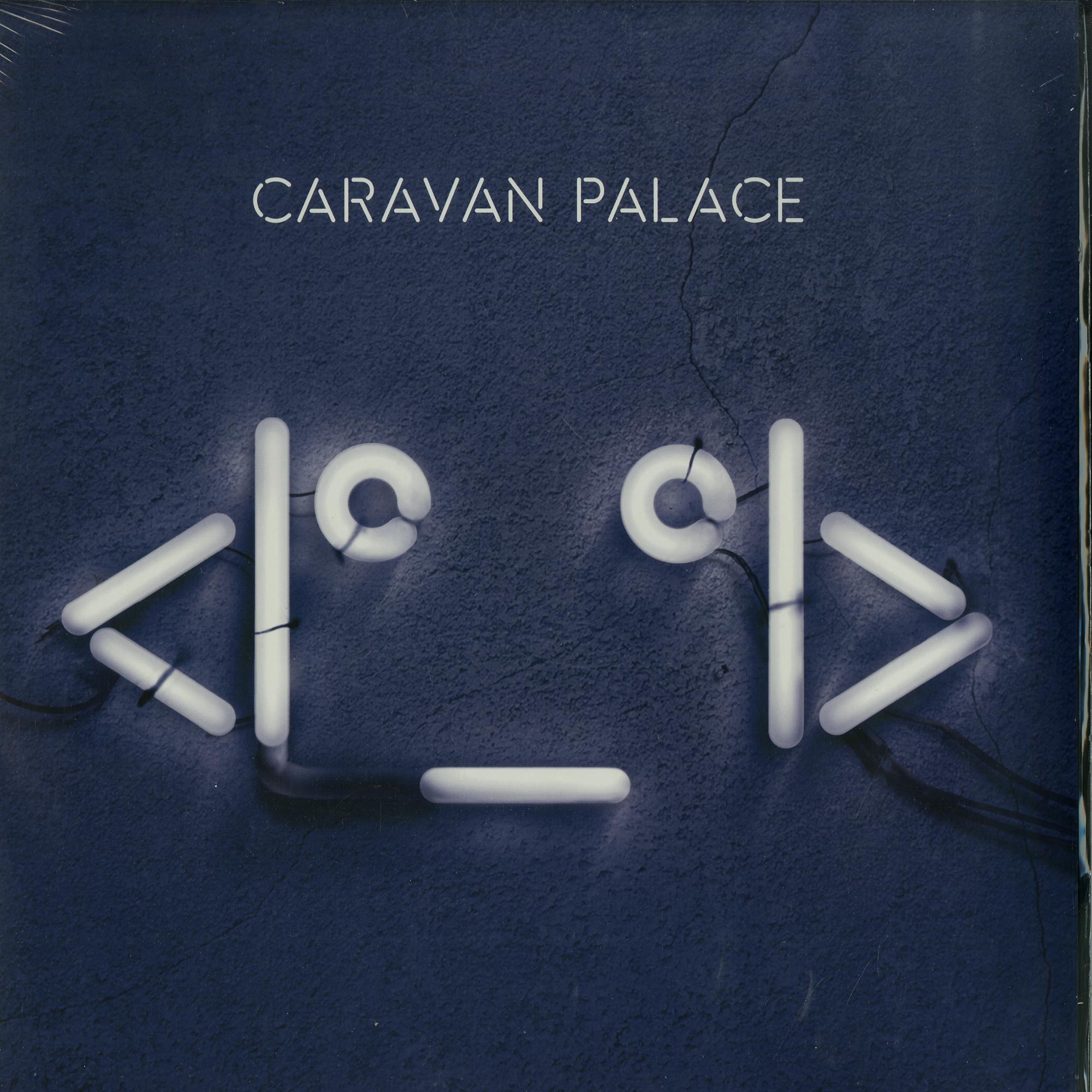 Caravan palace. Caravan Palace Lone Digger обложка. Caravan Palace Robot face. Caravan Palace логотип. Caravan Palace обложки альбомов.